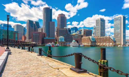 Boston skyline in sunny summer day, view from harbor on downtown, Massachusetts, USA